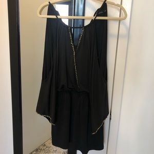 Black sequin romper by Ark & Co